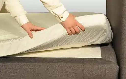 Hoe maak ik een matras met een topper op?